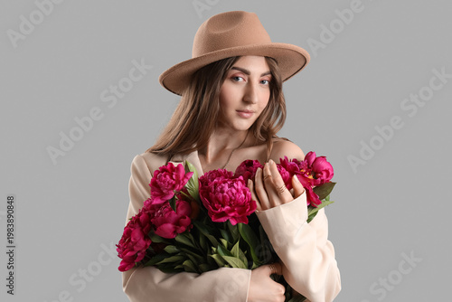 Beautiful young woman with ...