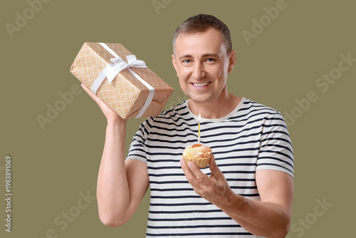 Mature man with birthday ta...