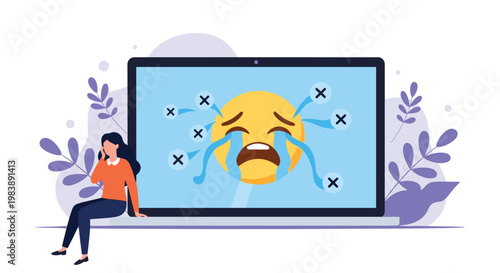 Depressed woman sitting on a laptop with a sad crying emoji on screen, reflecting the negative impact of cyberbullying and online distress.
