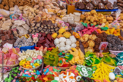 Traditional Ecuadorian Sweets Display for Corpus Christi Festival in Cuenca, Ecuador. Colorful candy in street market