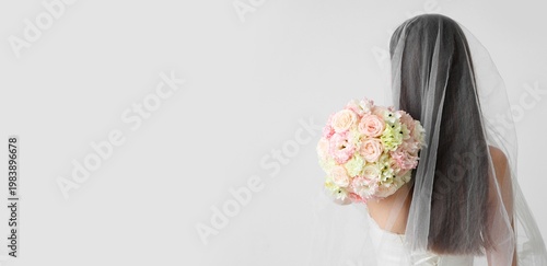 Beautiful bride with weddin...