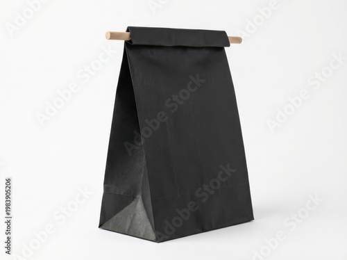 Black paper bag with wooden handle minimalist packaging and product presentation