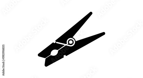 A black clothing pin shown in a striking silhouette