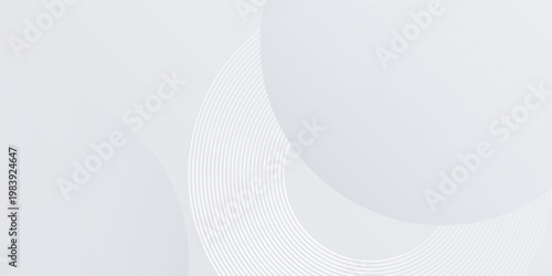 Modern white glowing geometric lines on gray background. Futuristic technology concept. Modern shiny white circle lines pattern abstract