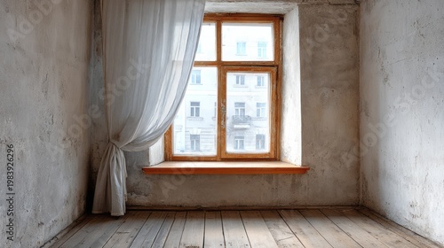 Empty room with light curtain and wooden window frame.