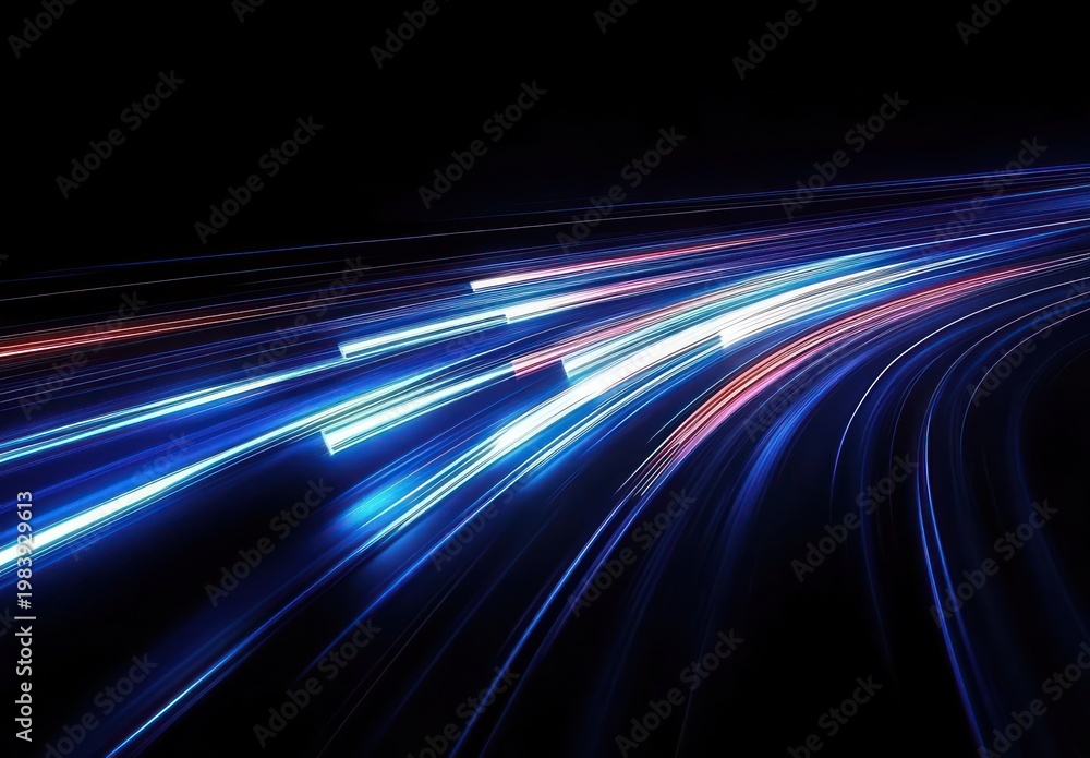 Fototapeta premium curving blue, white, and red light trails racing across a black background, evoking speed, motion, and energetic futurism