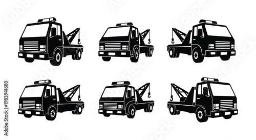 Black tow trucks in various positions a striking silhouette