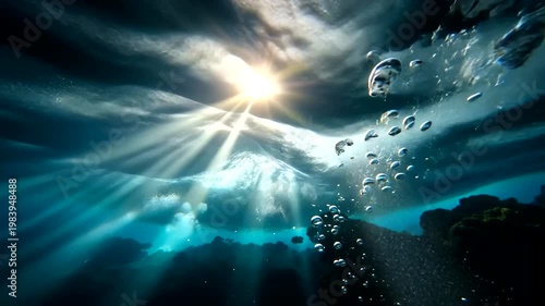 Stunning Underwater Sunlight Rays and Bubbles in Deep Blue Water.