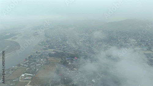 Aerial View of Aalo Town and River Covered in Fog in Arunachal Pradesh India