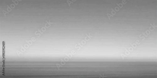 Abstract minimal and calming a grayscale view depicting the serene expanse of the ocean meeting the horizon, evokes a sense of vastness and quiet reflection.