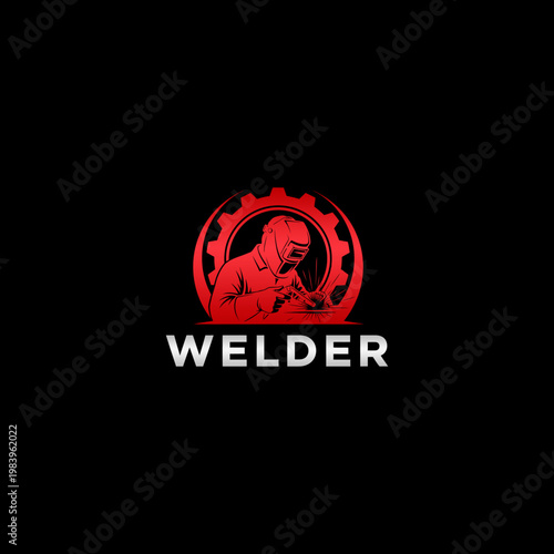 Welder working with welding torch equipment.