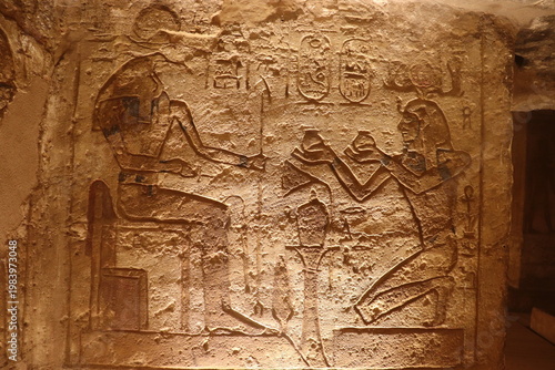 Ancient egyptian hieroglyphics at Abu Simbel temple, Aswan, Egypt