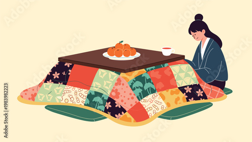 Japanese woman enjoys a warm winter evening sitting at a traditional kotatsu table with fresh oranges and hot tea.