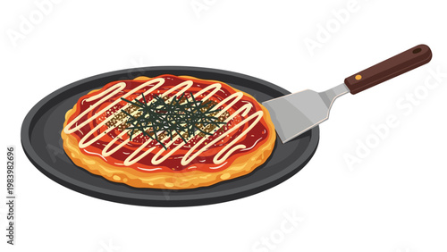 Savory Japanese okonomiyaki pancake topped with sauce and seaweed served on a black hot plate with a metal spatula nearby.