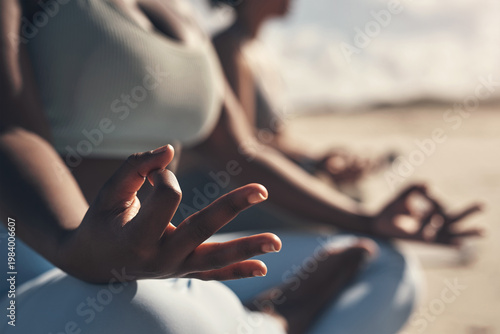Foto Yoga, hands and women on beach with meditation, summer and balance together for zen