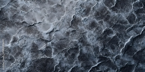 Abstract Cracked Surface Texture In Dark Gray Blue And White Hues Suggesting A Rocky Or Geological Formation Close Up