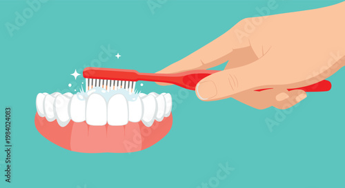 Human hand using a red toothbrush to clean white teeth with toothpaste bubbles against a turquoise blue background.