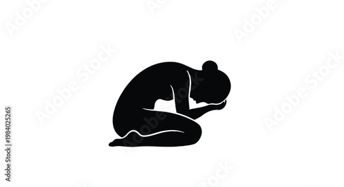 Silhouette of a woman in distress, head bowed in sorrow and despair
