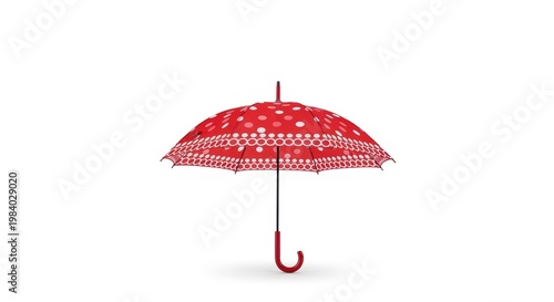 Elegant red patterned umbrella standing against a plain background