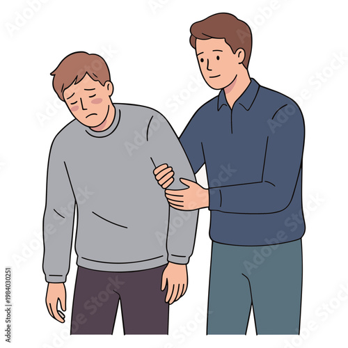 Man supporting another man with a concerned expression on his face indoors.