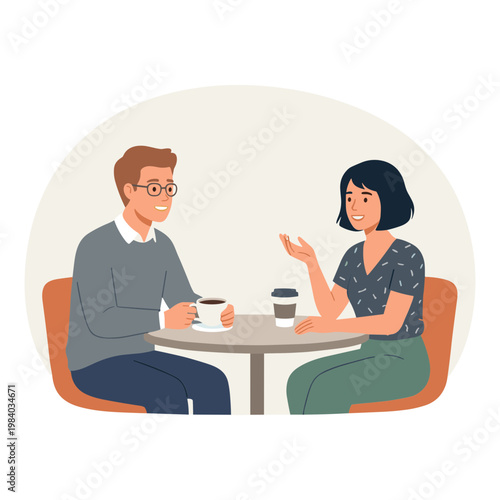 Man and woman sitting at a table talking over coffee in a casual setting
