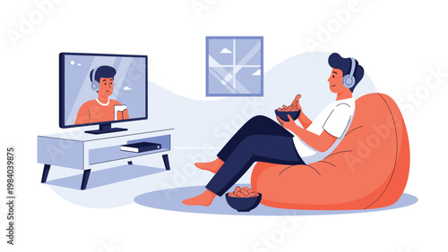 Relaxed man wearing headphones sits in an orange bean bag chair while enjoying a video program on a flat screen television at home.