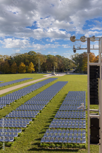 Jasna Gora Monastery meadows with monument to Our Lady Immaculate and chairs for the faithful, Czestochowa, Poland