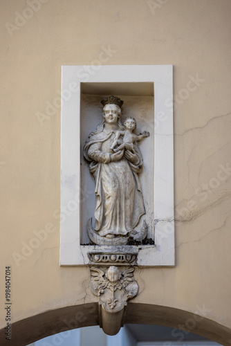 Statue of Virgin Mary with Child in niche on wall of 14th century baroque Jasna Gora Monastery, Czestochowa, Poland