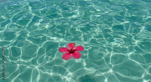 Clear turquoise swimming pool water surface with ripples, reflections and abstract wave texture