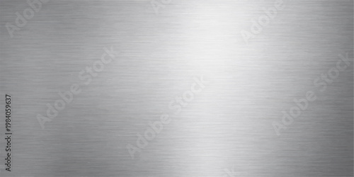 A polished silver stainless steel plate with a shiny brushed metal texture and a grey industrial aluminum surface pattern makes a sleek metallic backdrop