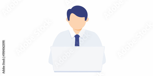 A faceless man in a suit working on a laptop computer