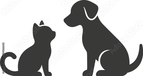 Silhouettes of a black cat and a black dog facing each other, symbolizing the classic companionship and contrast between these popular domestic pets.