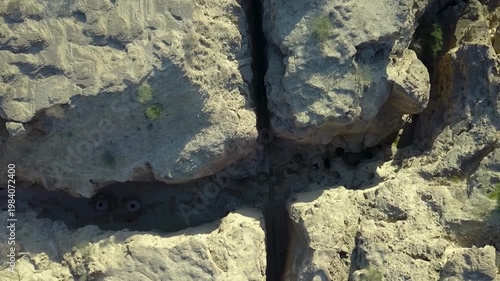 Stunning Aerial View of Qeshm's Chahkooh Canyon Unique Geological Rock Formations on Qeshm Island. a great canyon of the middle east , major asset for Iran's tourism industry, affected by Iran Israel 