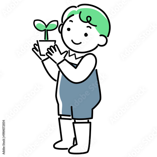 植物を育てる男の子