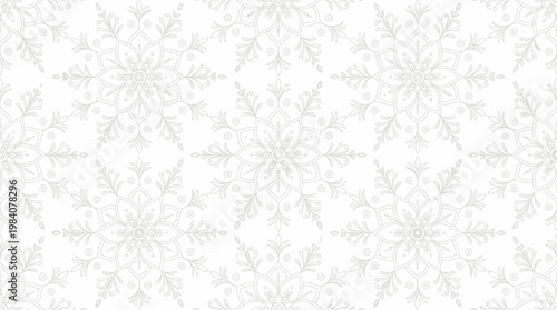Intricate white snowflake seamless pattern for decorative backgrounds and textiles.