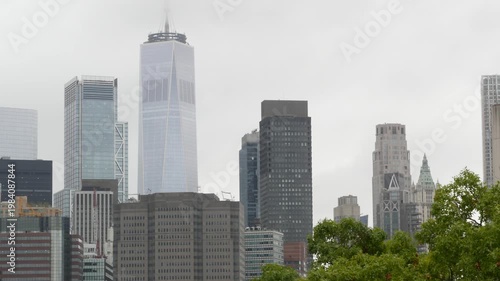 Manhattan downtown skyline from Squibb park in Brooklyn Heights, New York City, United States. Financial district skyscrapers buildings. American architecture of business center. World trade center.