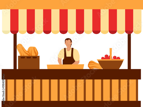 A man standing behind a food stand with bread and fruit