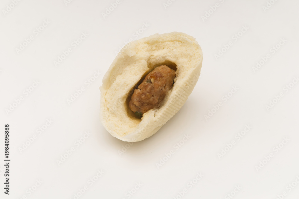 Obraz premium Steamed Bun with Meat Filling, Cut Open