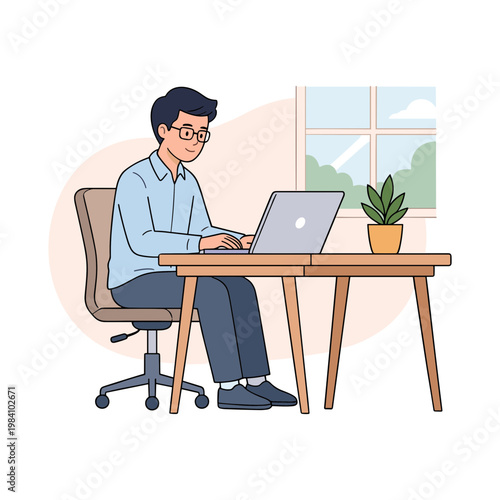 A man works on his laptop at a desk by the window indoors.
