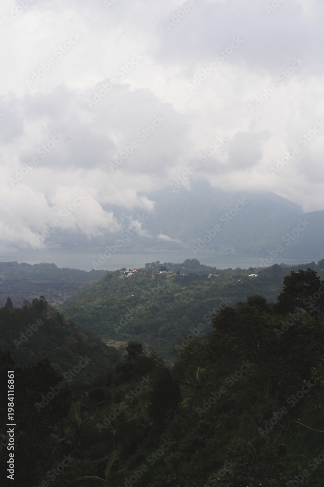 Fototapeta premium Panoramic view of Lake Batur and volcano with lava fields, Kintamani