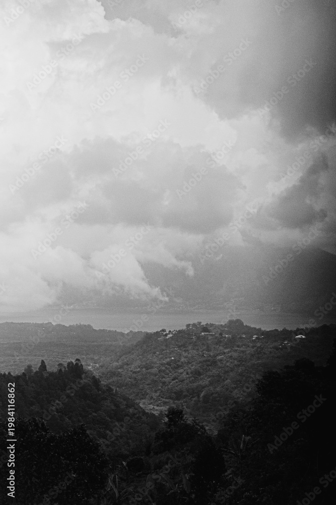 Fototapeta premium Black and white panoramic view of misty Bali valley