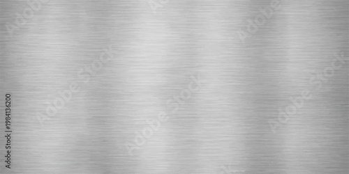 Industrial brushed metal texture with a polished stainless steel plate pattern and shiny silver aluminum reflection on a grey metallic sheet material