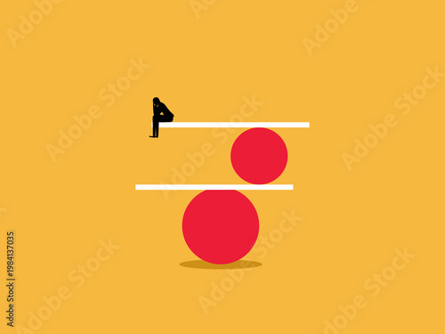 businessman looked dejected while balancing on a ball.