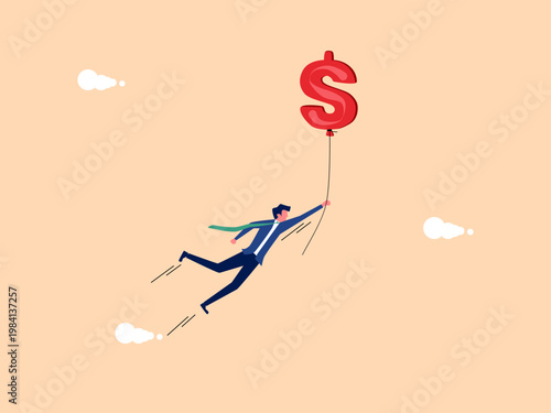 businessman flies in a money balloon