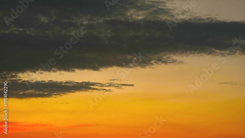 Beautiful Sunset Sky with Dramatic Clouds and Vibrant Color Gradients Over Horizon