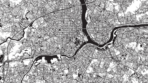 Aerial view of a city and river landscape in black and white