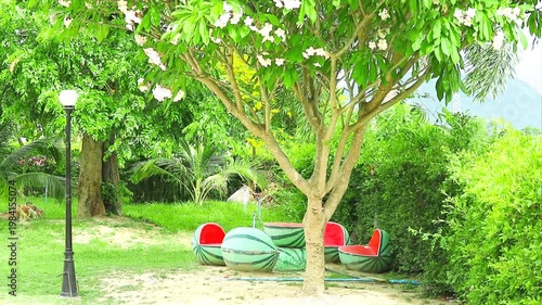 Sitting in the garden under the trees It is designed in the shape of a watermelon