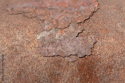 Photos Close up rust on metal peeling flake revealing layered brittle crust and curled