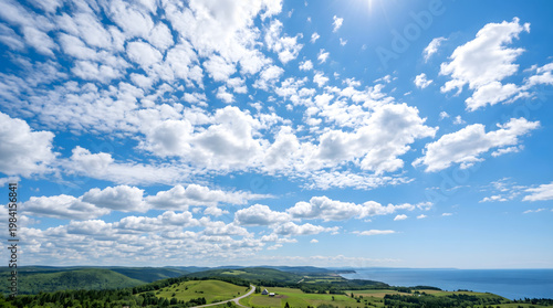 Foto Breathtaking wide-angle panoramic view of rolling green hills overlooking the de