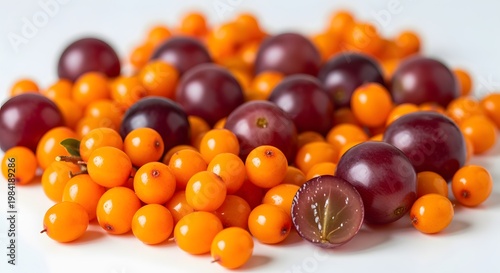 Vibrant Sea Buckthorn Berries and Grapes - A Colorful and Delicious Harvest.